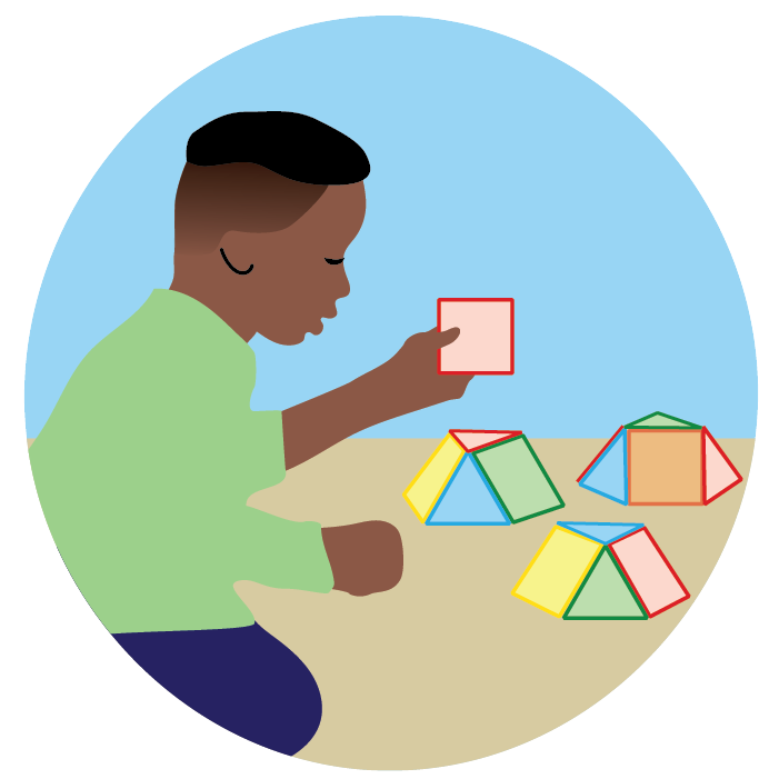 Child playing with various shaped blocks